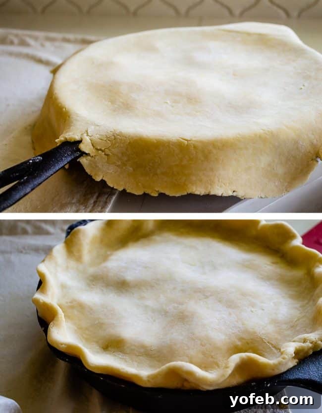 One Skillet Shepherd's Pot Pie from The Food Charlatan. It's like Shepherd's Pie and Chicken Pot Pie got together and had a baby to make a One Skillet Shepherd's Pot Pie! Regular skillet shepherd's pie would feature mashed potatoes, but instead we are covering ours up with a super flaky pie crust, just like it's a pot pie. It's comfort food heaven!! #recipe #easy #best #beef #traditional #skillet #castiron #casserole #withgravy #withcrust #cheddar #onepot #cheese #carrots #peas #flaky #crust skillet shepherds pie sliced and served