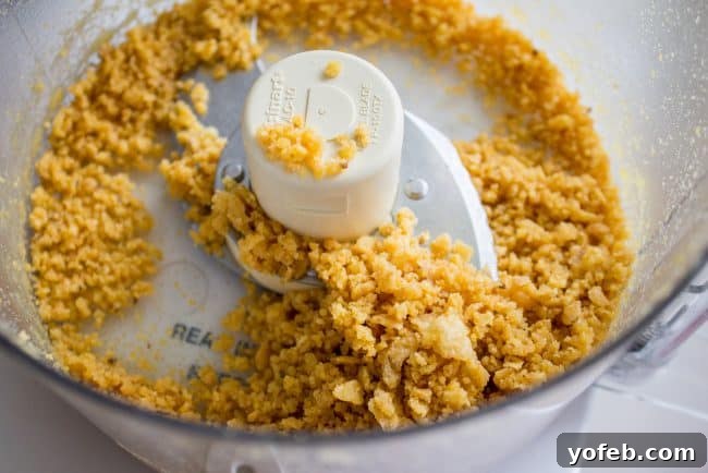 The Secret Ingredient: Crushed Fritos Crushed Fritos mixed with milk for the meatball binder.