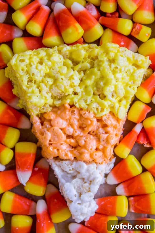 Colorful and Easy Candy Corn Rice Krispies Treats Close-up of Candy Corn Rice Krispie Treats, highlighting the vibrant colors and soft texture.