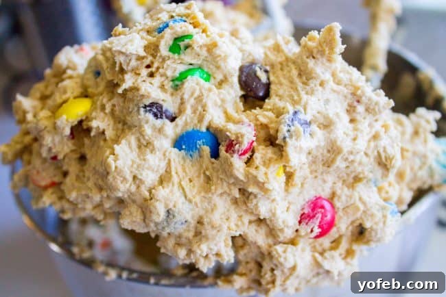 Gooey monster cookie dough Gooey cookie dough filled with M&Ms, oats, and peanut butter goodness.