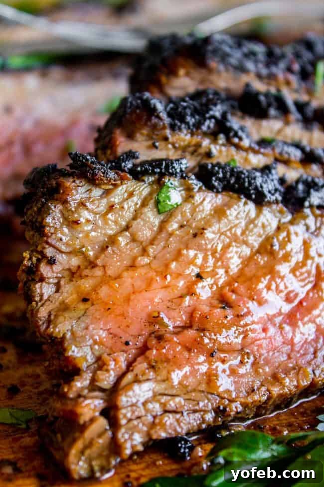 The Food Charlatan's 10 Unforgettable Recipes from 2018 3 Perfectly sliced, juicy tri-tip steak showing a beautiful medium-rare interior.
