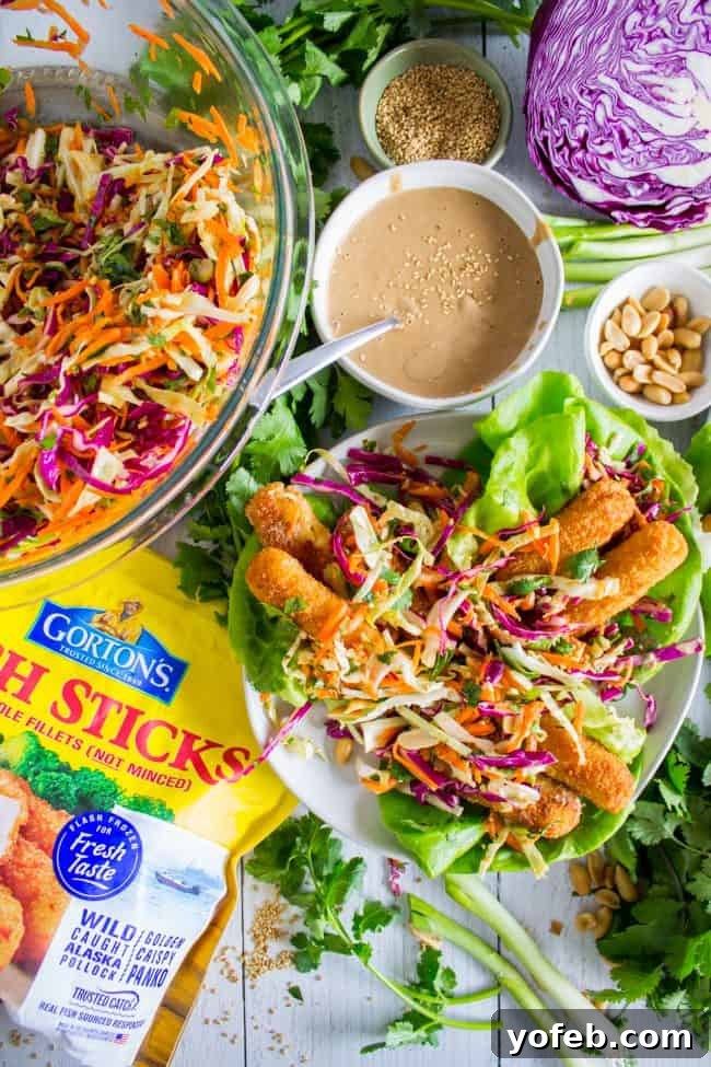 Crispy Fish Lettuce Wraps with Zesty Asian Slaw and Peanut Sauce. Thai fish tacos.