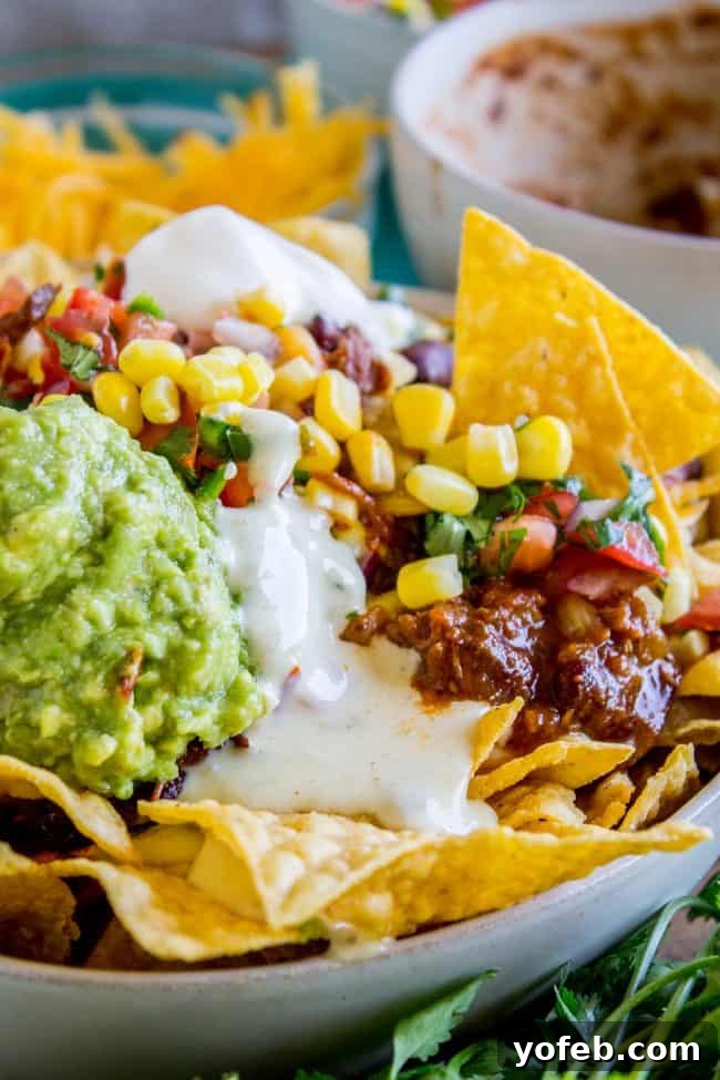 Stacked Chili Nachos with Molten Queso and Fresh Guacamole 9 Various ways to enjoy leftover chili, including a large sheet pan of nachos for a party.