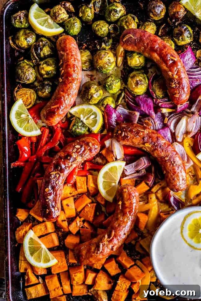 Lemon Aioli Roasted Sausage & Veggies 4 A delicious serving of One Pan Sausage and Veggies with Lemon Aioli, showcasing the golden-brown roast and fresh garnish.