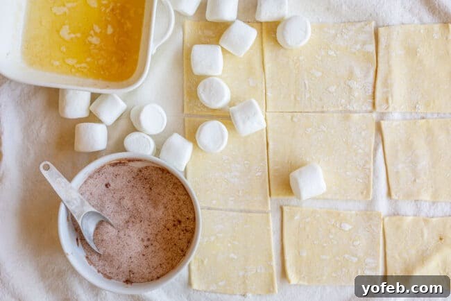 Step-by-step Empty Tomb Rolls preparation: coating marshmallows and wrapping in dough. Empty Tomb Rolls in various stages of preparation: marshmallows being dipped in butter and cinnamon sugar, and then wrapped in puff pastry.