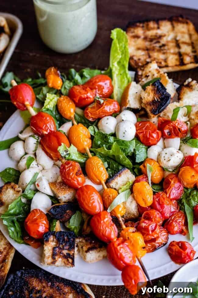 The Perfect Pairing: Fresh Mozzarella and Grilled Tomatoes Fresh mozzarella pearls mixed into a Caprese salad