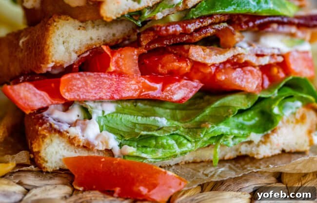 Crafting the Flawless BLT 14 close up photo of sliced BLT sandwich