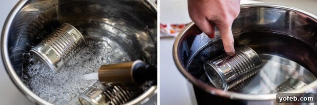 Prepared cans of sweetened condensed milk placed inside an Instant Pot, ready for pressure cooking.
