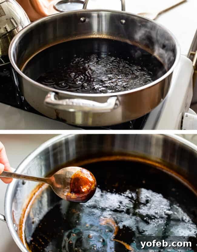 Simmering Balsamic Vinegar for Reduction Balsamic vinegar gently simmering in a metal saucepan, showing light bubbles indicating the reduction process.