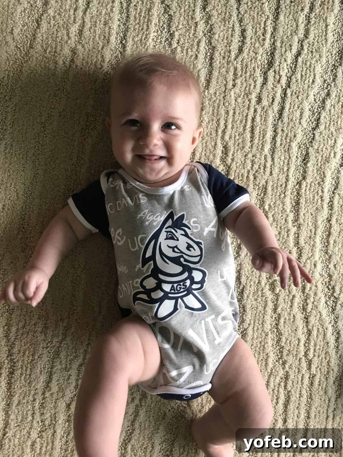 Greek Chicken Zoodle Pasta 2 Charming photo of baby Edison in a UCD Aggie onesie, a sweet family moment shared alongside a focus on healthy eating and balancing life with four children.