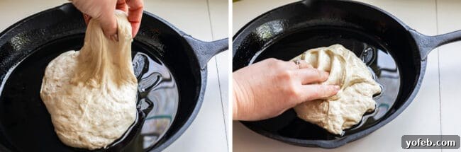 Gently placing the prepared pizza dough into a generously oiled cast iron skillet.