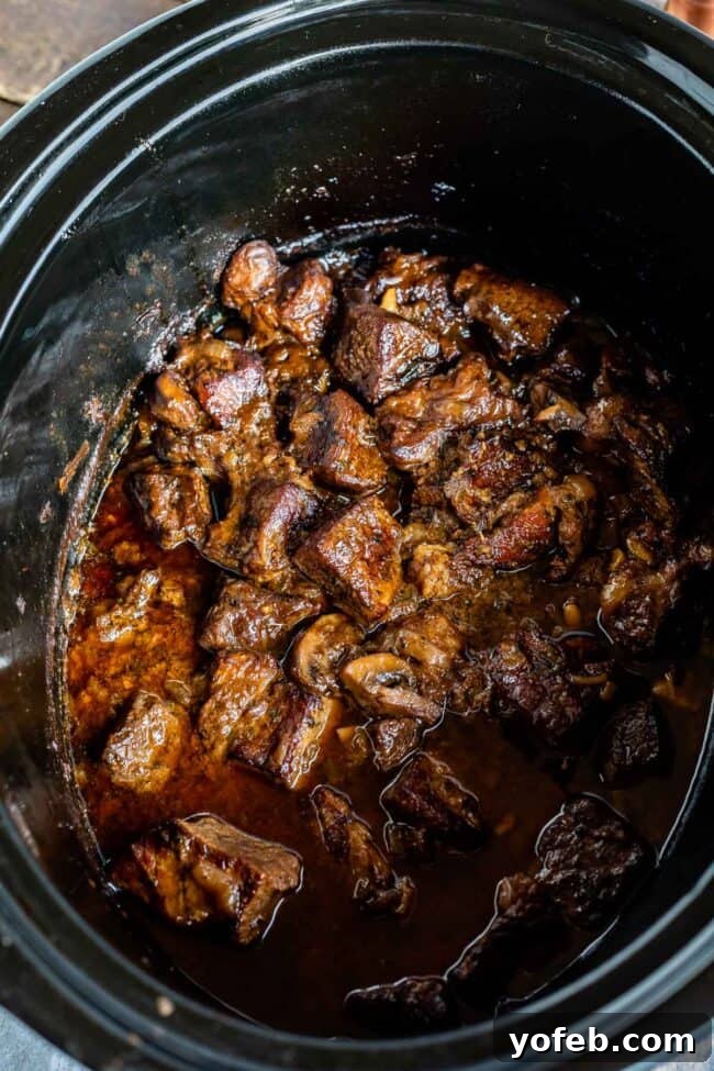 Homestyle Slow Cooker Beef Stroganoff 9 crock pot beef stroganoff shot from overhead, in the crockpot.