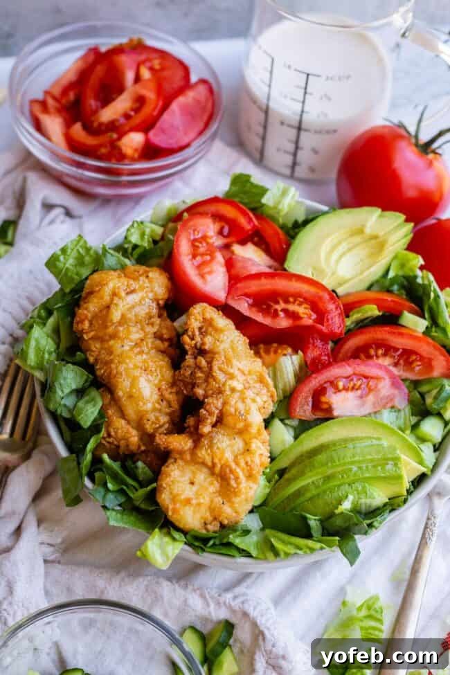 Chicken Salad with Crispy Topping Crispy chicken salad in a rustic bowl