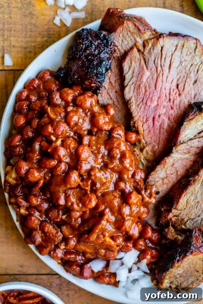 santa maria beans on a plate with tri tip.