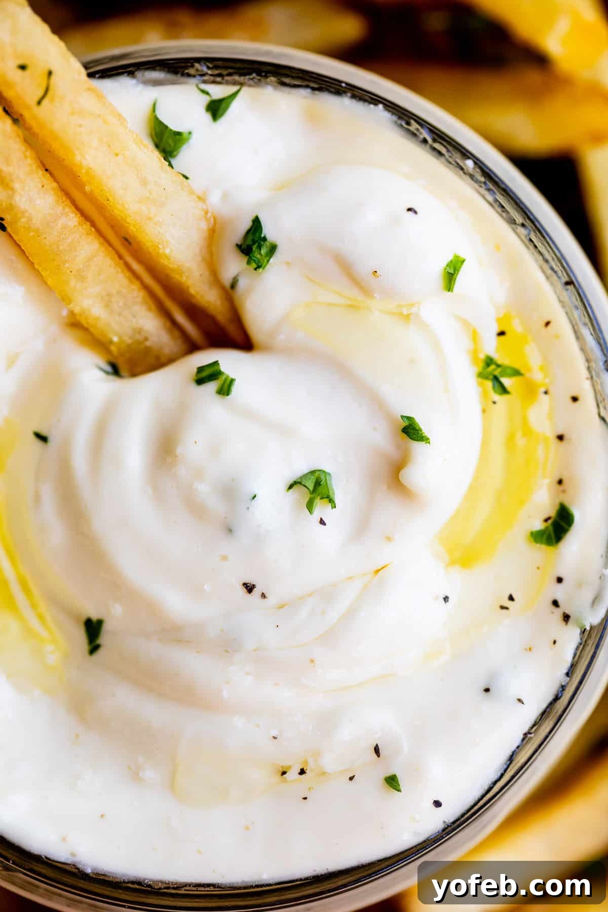 Close up shot of garlic aioli recipe with french fries