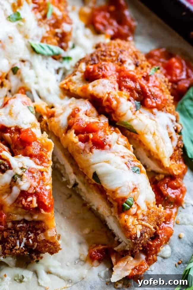 Heavenly Chicken Parmesan 4 classic chicken parmesan sliced into strips.