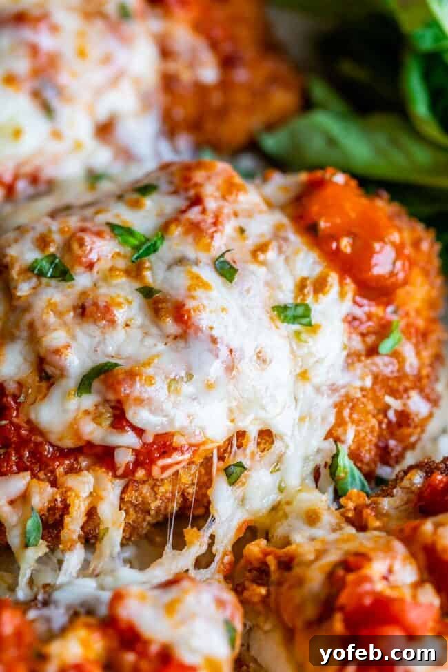 Heavenly Chicken Parmesan 6 close up shot on the side of homemade chicken parmesan recipe.