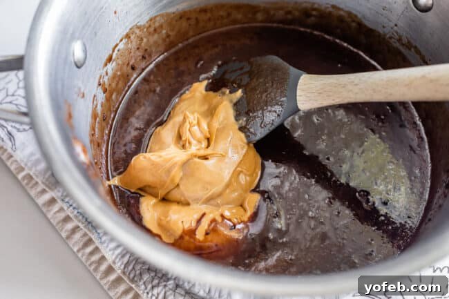 Easy No-Bake Peanut Butter Oatmeal Cookies 12 a pot of chocolate cookie batter with peanut butter