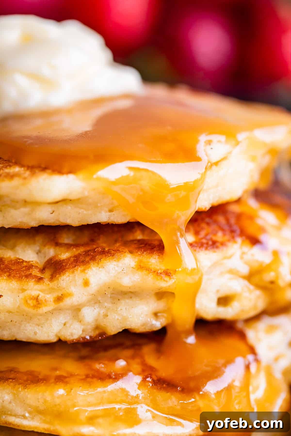 Velvet Smooth Buttermilk Syrup 14 homemade buttermilk syrup drizzled over pancakes with butter.