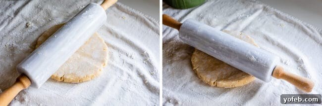 A rolling pin being rotated a quarter turn while rolling out pie dough, a key technique for achieving a perfectly round crust.