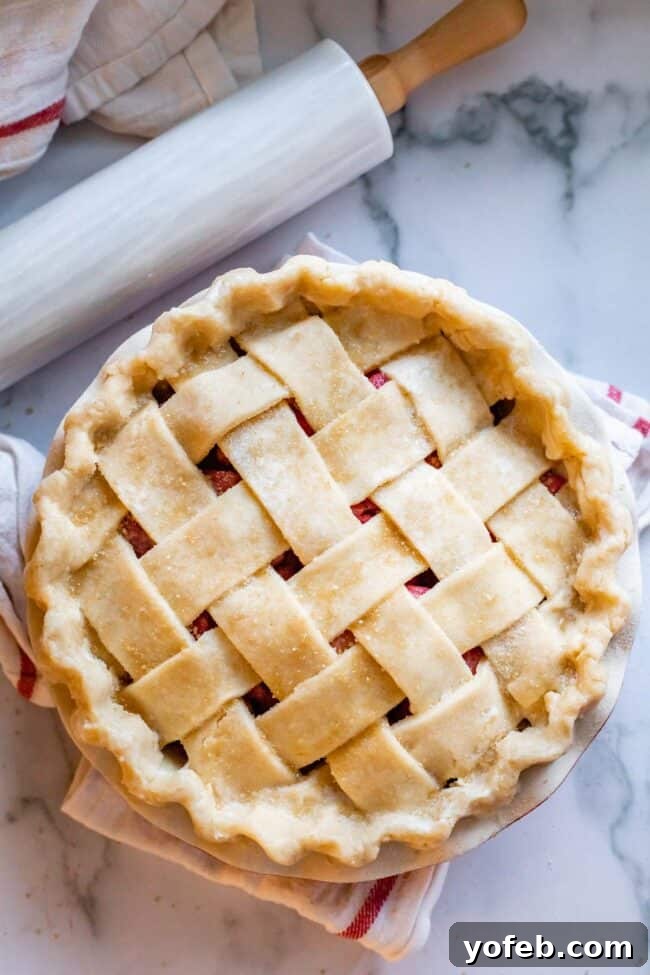 A Visual Guide to Making a Lattice Pie Crust 2 raw lattice pie crust with crimped edges