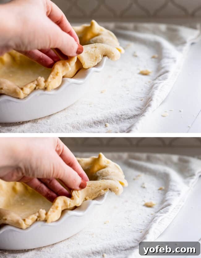 How to Pre-Bake Your Pie Crust Perfectly 5 A close-up view demonstrating how to meticulously fold the excess edge of the pie crust underneath itself, creating a clean and thick border ready for decorative crimping.