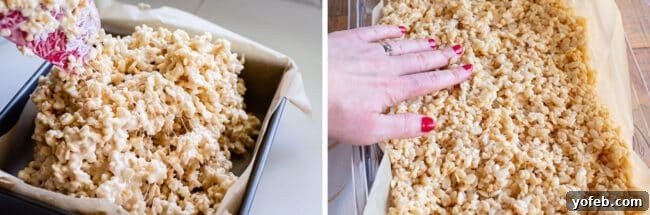 Foolproof Rice Krispies Treats 13 Gently pressing Rice Krispie Treats into a pan with hands.
