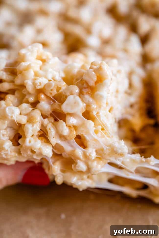 Foolproof Rice Krispies Treats 7 A Rice Krispie Treat showing an incredible marshmallow stretch.