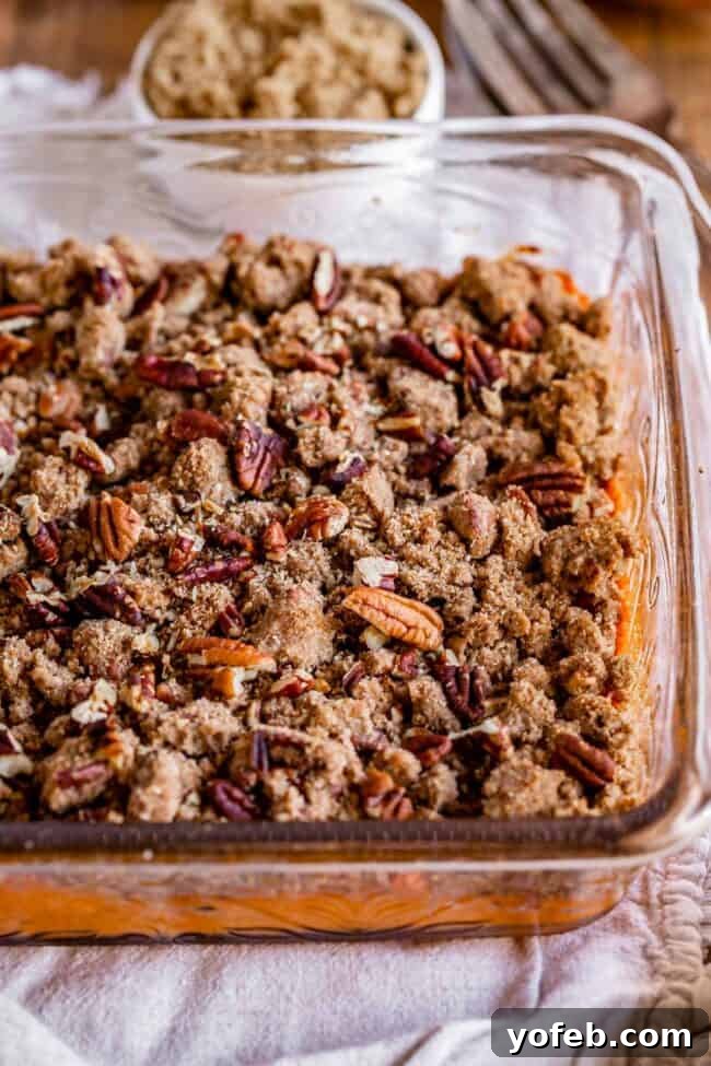 Heavenly Sweet Potato Crumble 12 A beautiful streusel-topped sweet potato casserole in a glass baking dish, fresh from the oven.