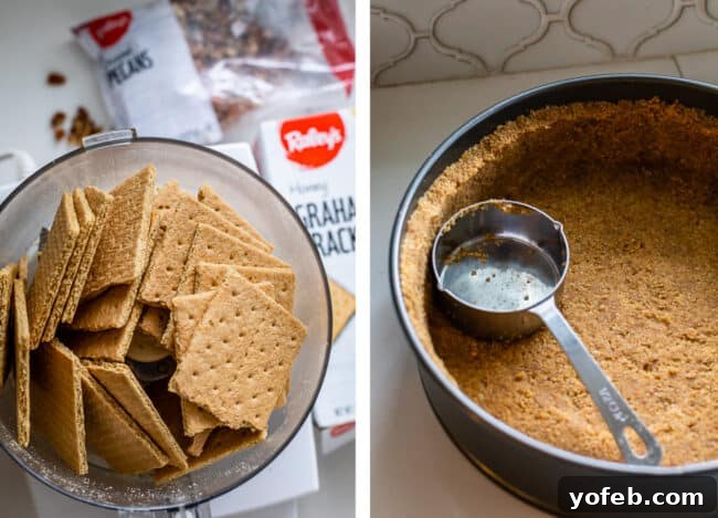 Crushed graham crackers in a food processor, ready to be combined with pecans and other ingredients for the cheesecake crust.