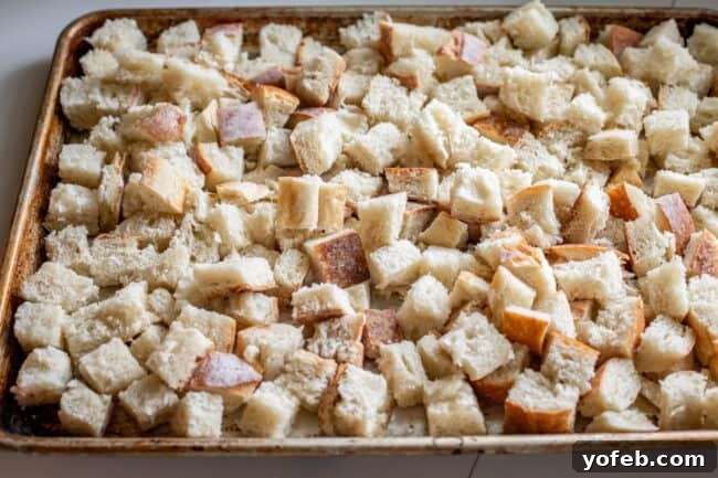 The Ultimate Thanksgiving Stuffing 10 cubed bread on a sheet pan