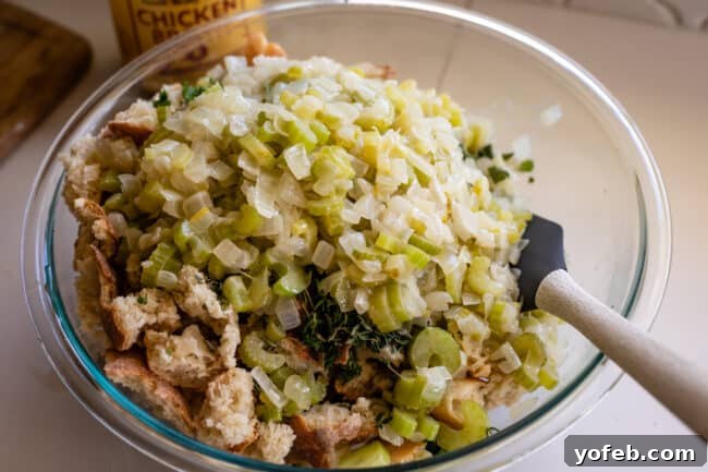 The Ultimate Thanksgiving Stuffing 16 sauteed celery and onions on top of a bowl of cubed bread
