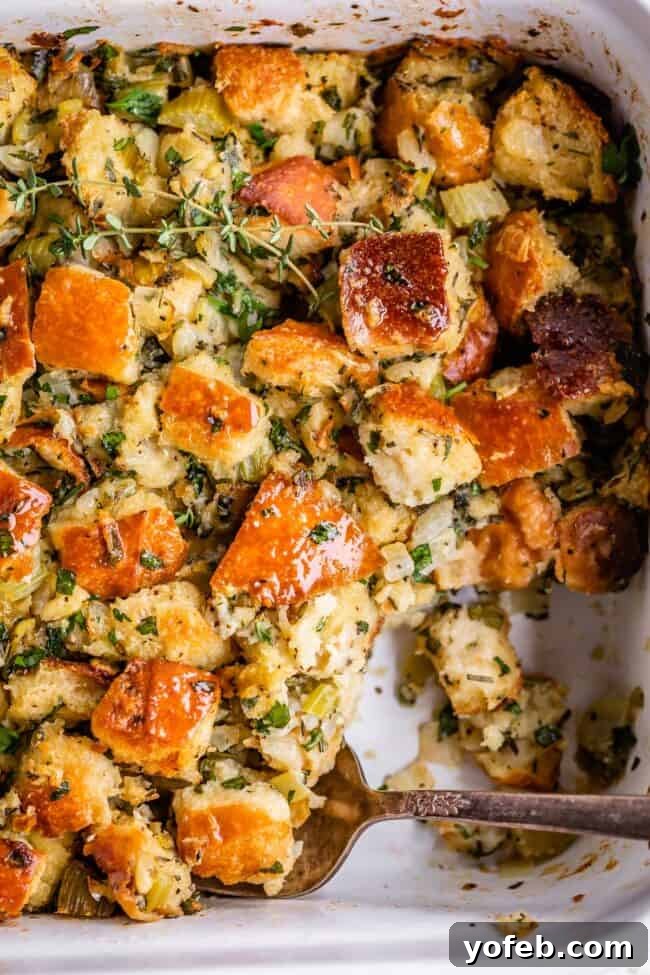 The Ultimate Thanksgiving Stuffing 24 overhead shot of easy stuffing recipe in a white pan