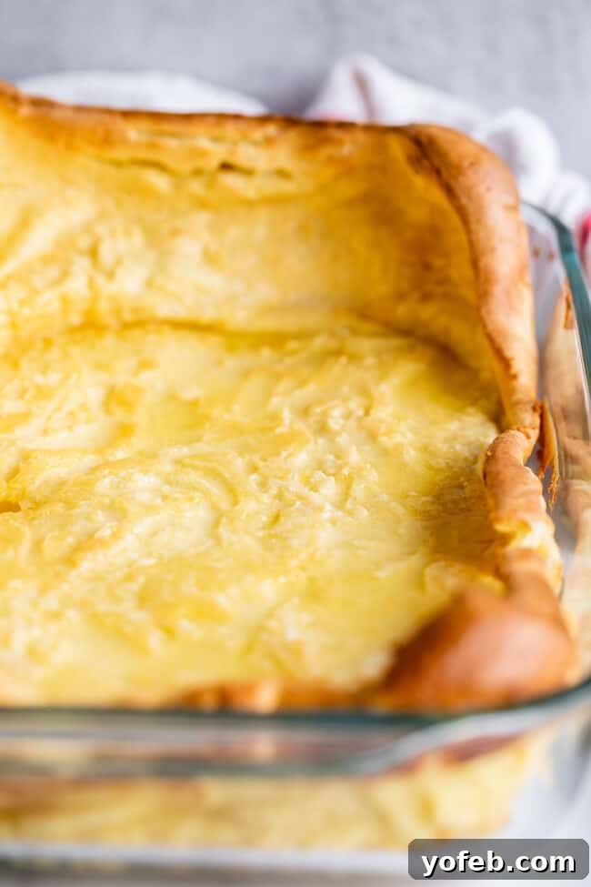German pancakes in a 9x13 pan, just out of the oven with puffy edges.