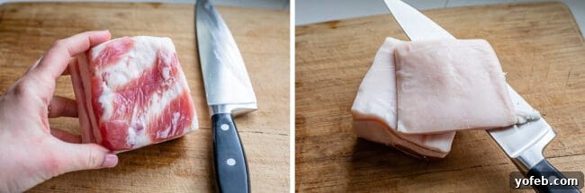 Classic French Beef Bourguignon 7 A block of salt pork sits on a cutting board, with its tough rind expertly removed, ready to be sliced for cooking.