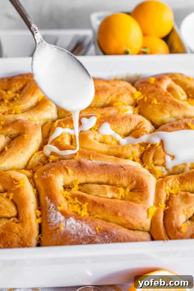 Meyer Lemon Sunshine Rolls 15 drizzling lemon glaze over lemon rolls