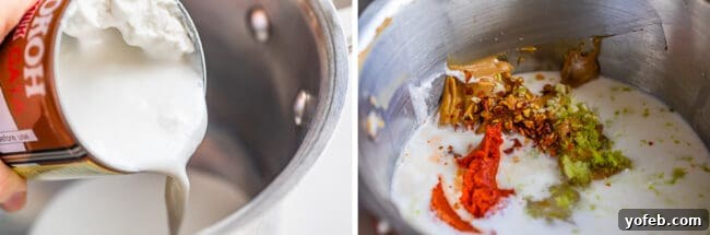Effortless Homemade Peanut Sauce 10 A dynamic image illustrating the process of making easy Thai peanut sauce: coconut milk is being poured into a saucepan already containing peanut butter, lime zest, and red curry paste, all on a stovetop.