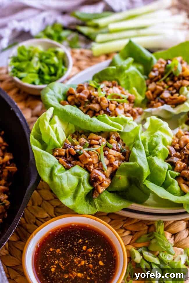 P.F. Chang's Style Lettuce Wraps at Home 17 Chicken lettuce wraps with a side of dipping sauce.