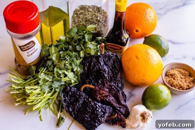 Mastering Carne Asada 11 all the ingredients needed for a beef mojo marinade: cilantro, peppers, orange, lime, etc.