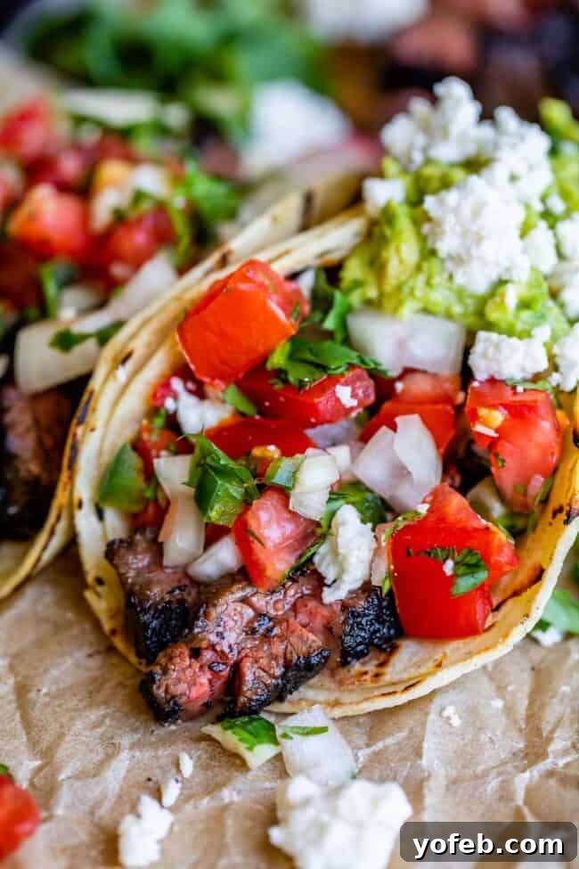 Mastering Carne Asada 8 carne asada meat in a tortilla with pico de gallo.