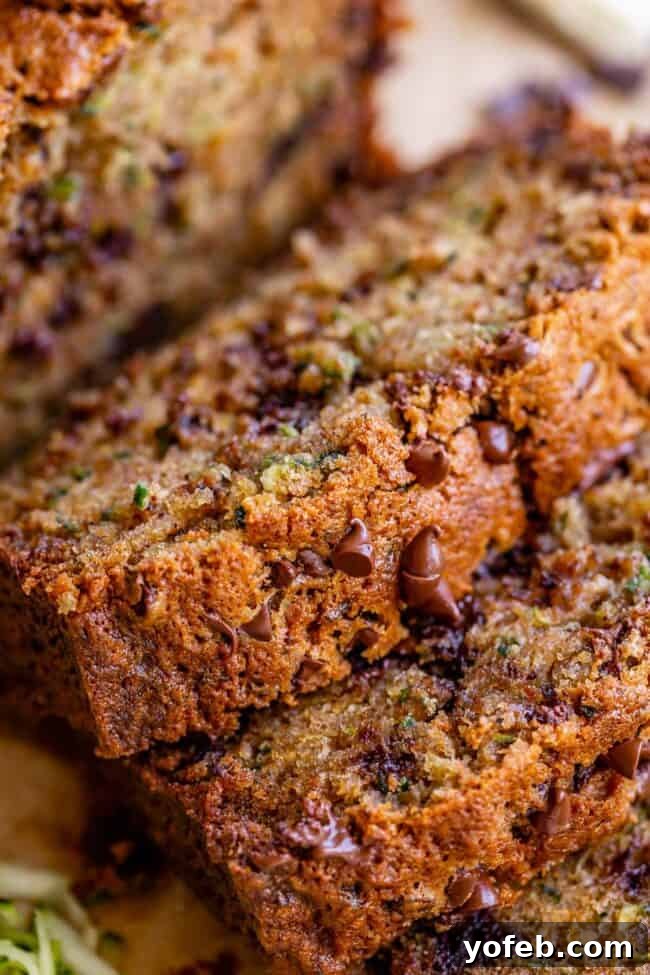 Heavenly Zucchini Bread 24 close up of sliced zucchini bread with mini chocolate chips.