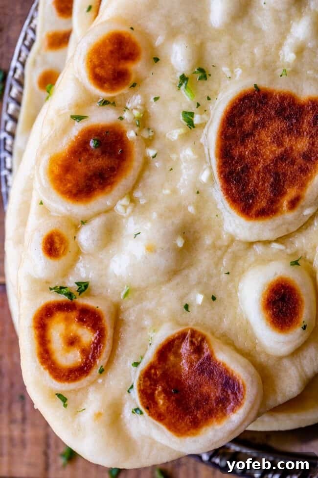 naan bread with butter, garlic, and parsley.