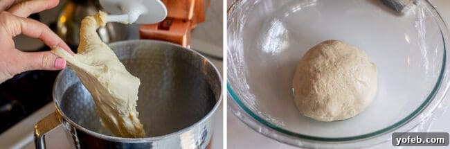 bread dough in a glass bowl covered with plastic wrap.