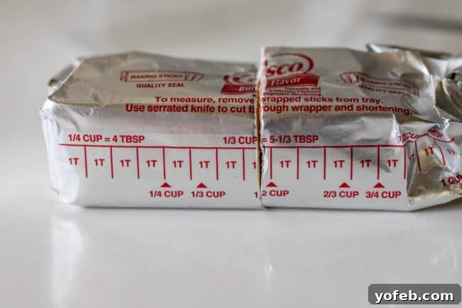 Dreamy White Chocolate Chip Treats 12 package of crisco on a countertop, cut in half