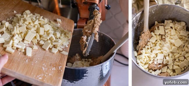 Dreamy White Chocolate Chip Treats 17 adding white chocolate from a cutting board to a stand mixer