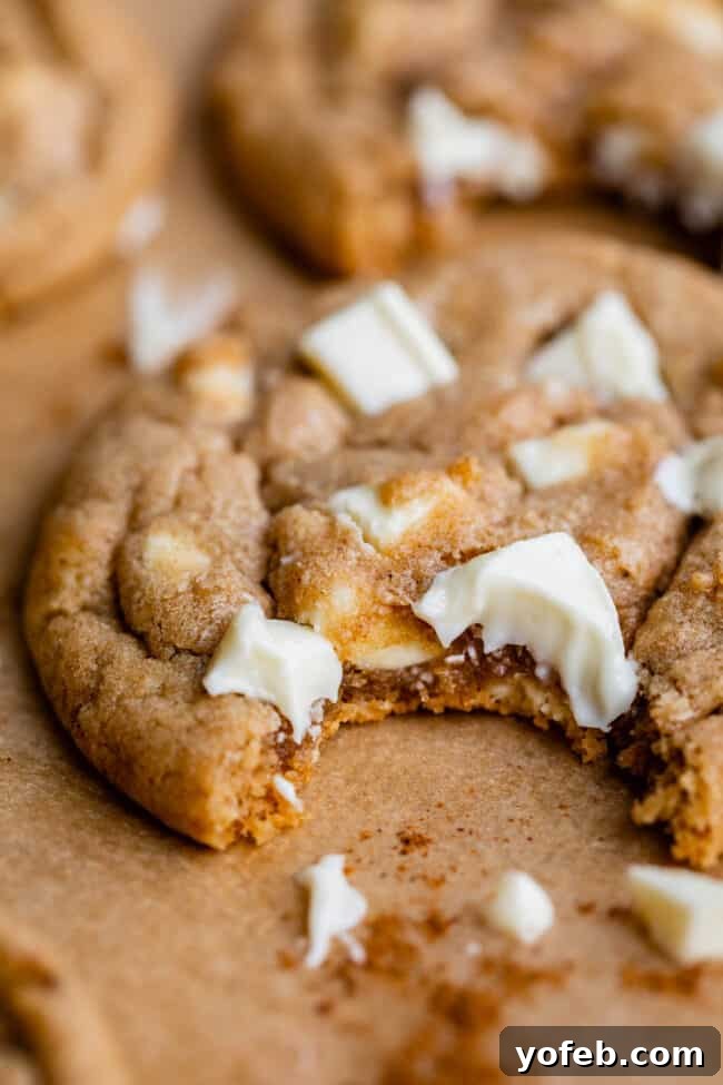 Dreamy White Chocolate Chip Treats 8 a bite taken out of white chocolate cookies