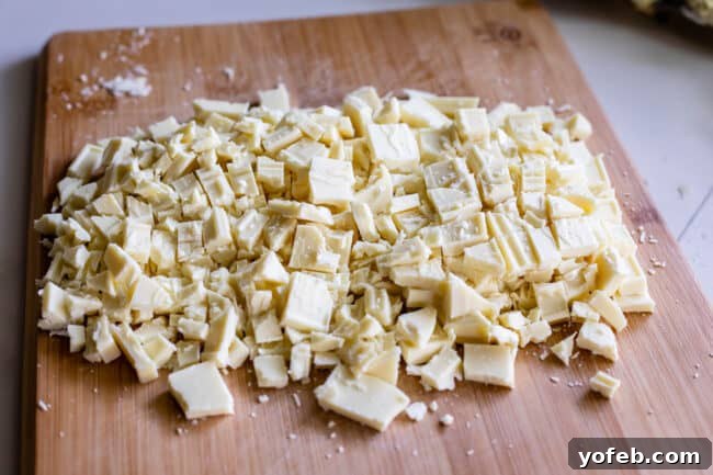 Dreamy White Chocolate Chip Treats 9 chopped white chocolate on a cutting board