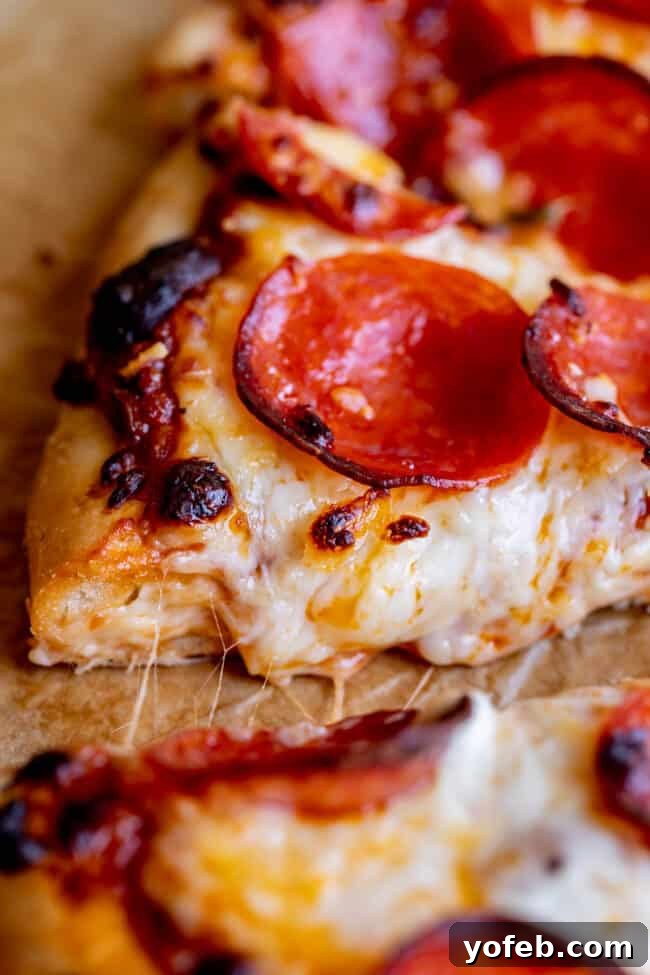The Ultimate Homemade Pizza Ready When You Are 4 A whole homemade pizza, showcasing the golden crust and abundant toppings.