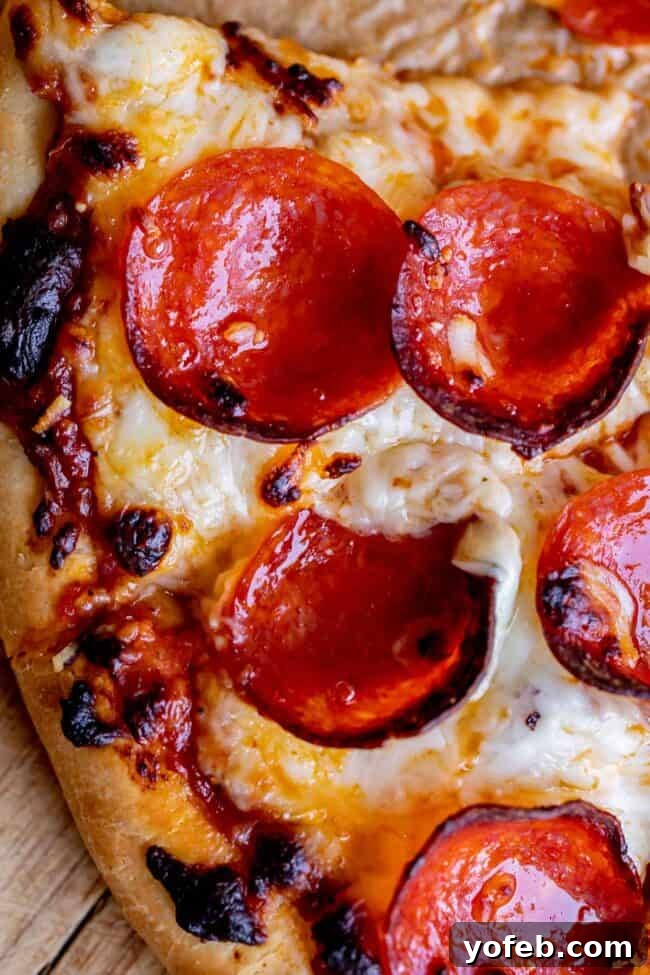 The Ultimate Homemade Pizza Ready When You Are 6 Delicious homemade pizza with melted cheese and classic pepperoni topping.