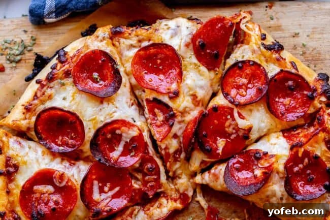 The Ultimate Homemade Pizza Ready When You Are 7 A whole homemade pizza, uncut and ready to be served.